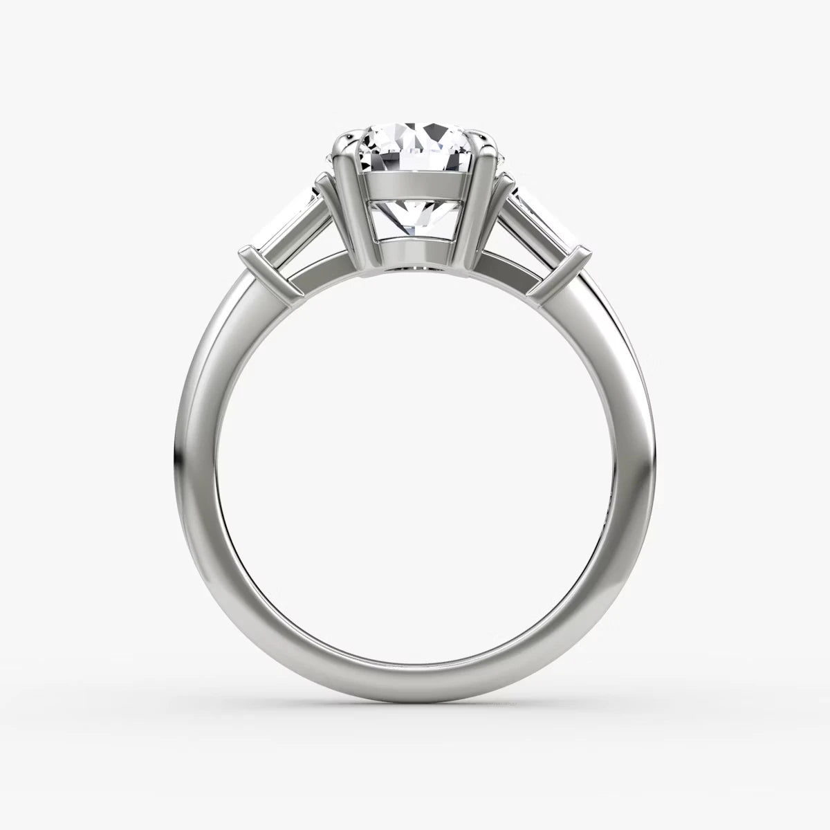The Tapered Baguette Three Stone Round Brilliant Yellow Gold Engagement Ring