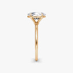 The Petite 4-Prong Solitaire Oval Yellow Gold Engagement Ring