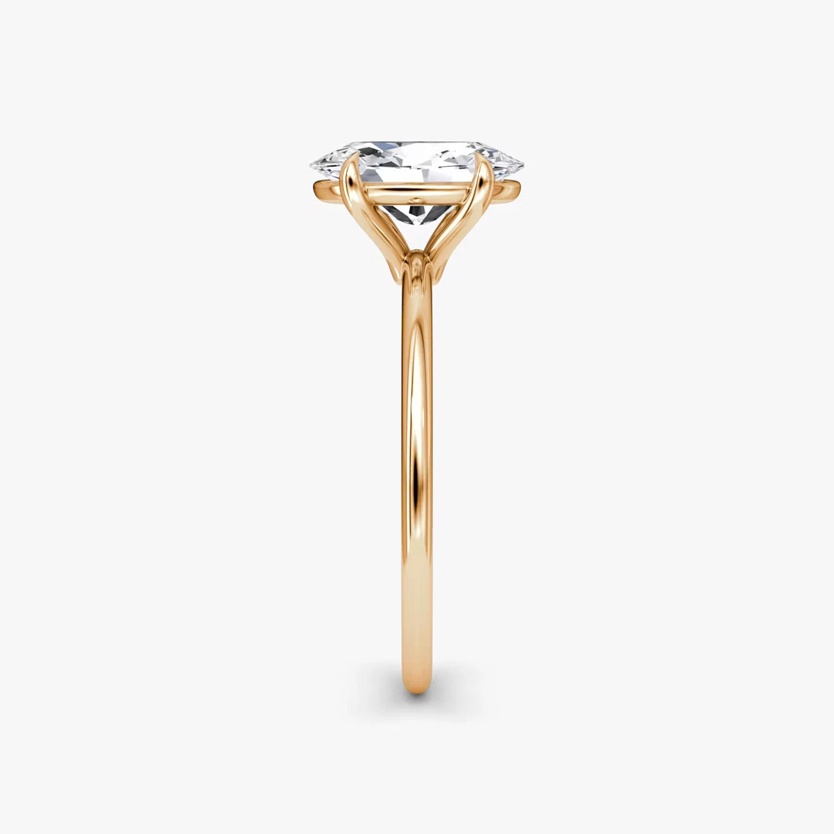 The Petite 4-Prong Solitaire Oval Yellow Gold Engagement Ring