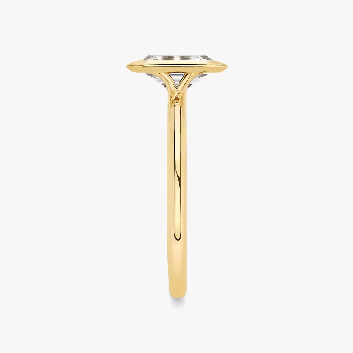 The Signature Bezel Emerald Yellow Gold Engagement Ring