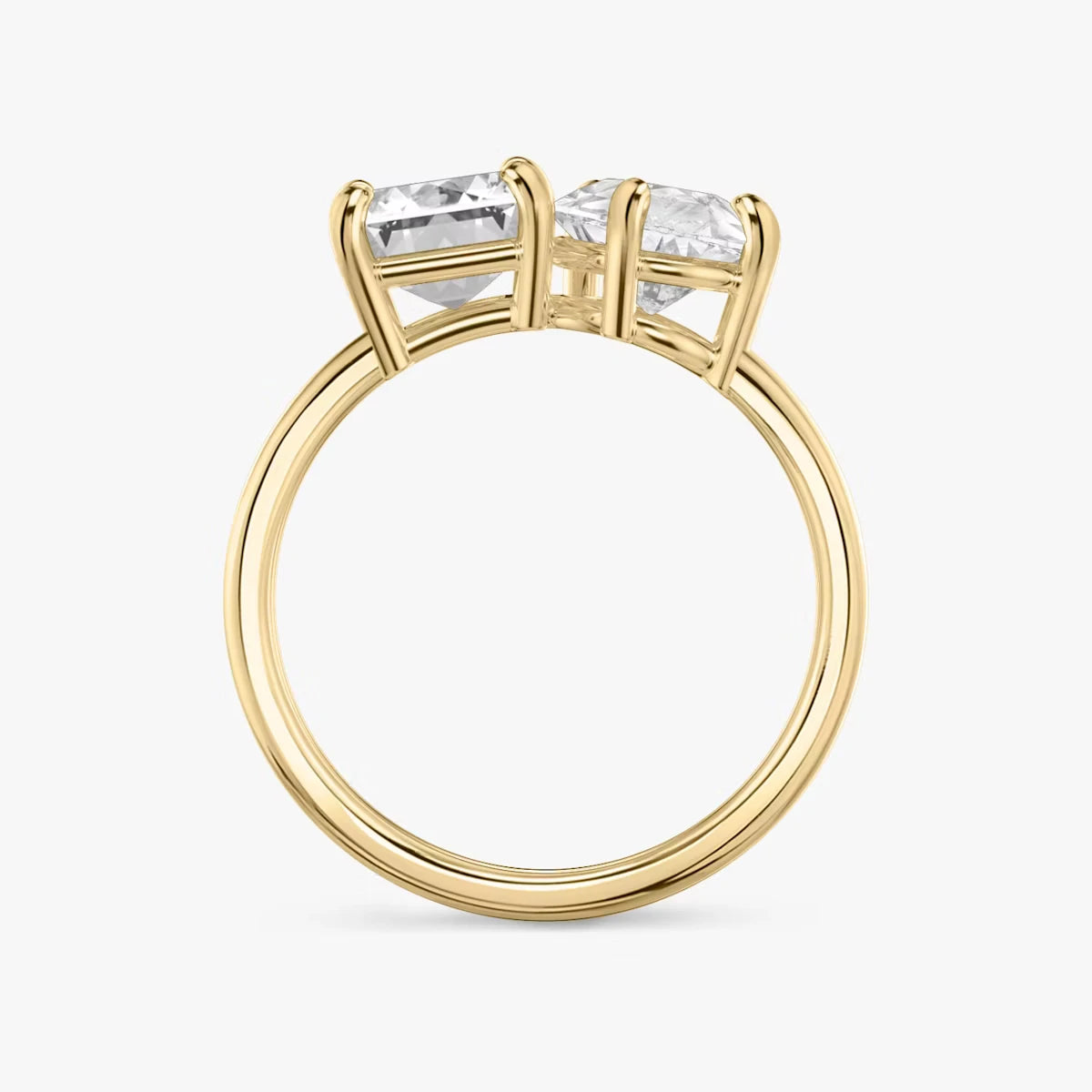 The Toi et Moi Emerald and Pear Yellow Gold Engagement Ring