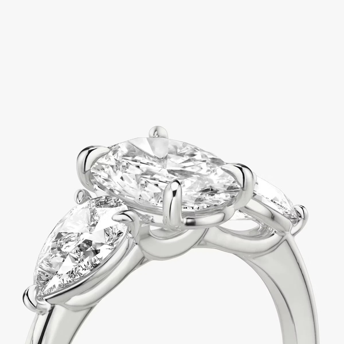 The Three Stone Oval Yellow Gold Engagement Ring