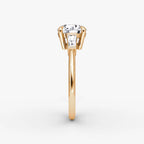 The Tapered Baguette Three Stone Round Brilliant Yellow Gold Engagement Ring