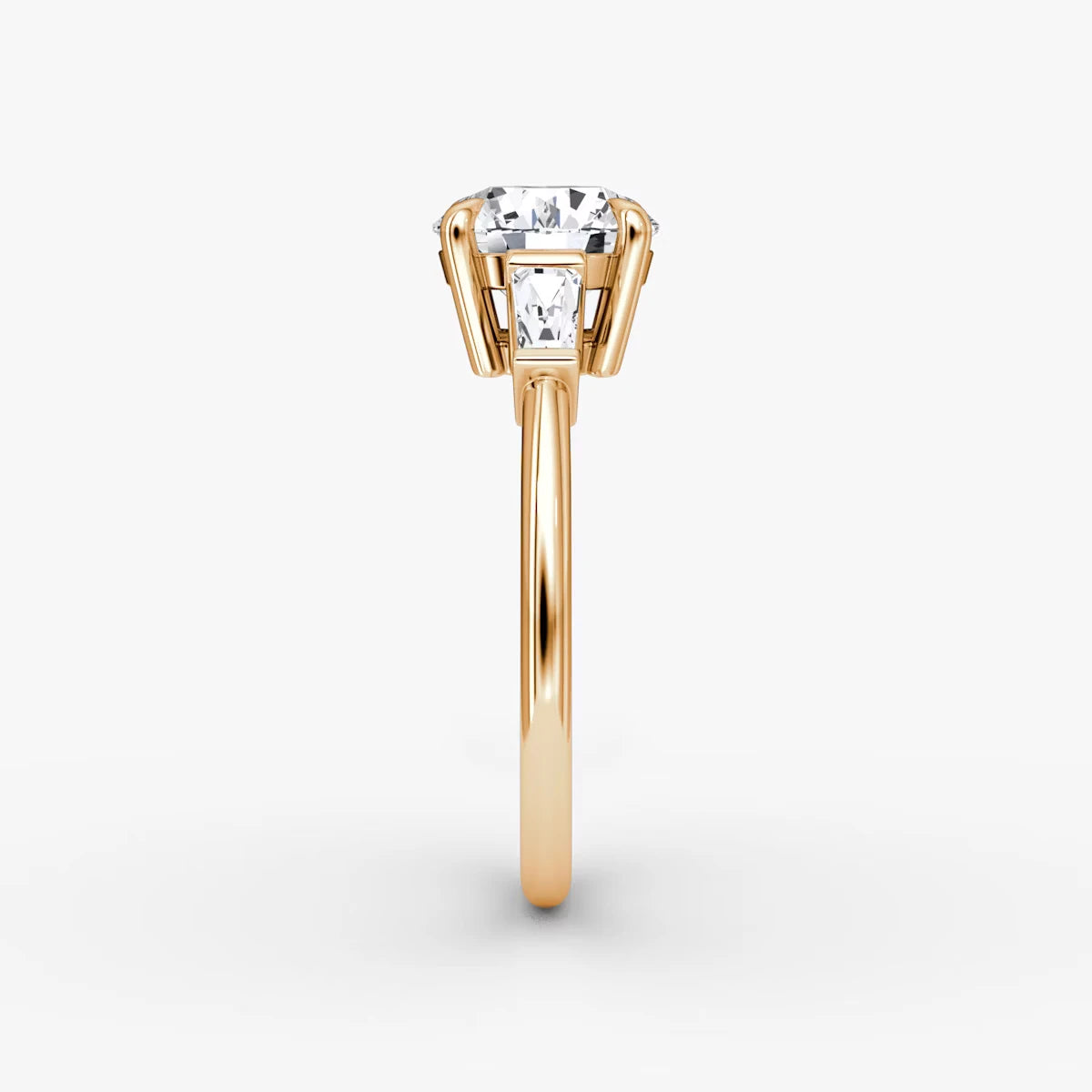 The Tapered Baguette Three Stone Round Brilliant Yellow Gold Engagement Ring