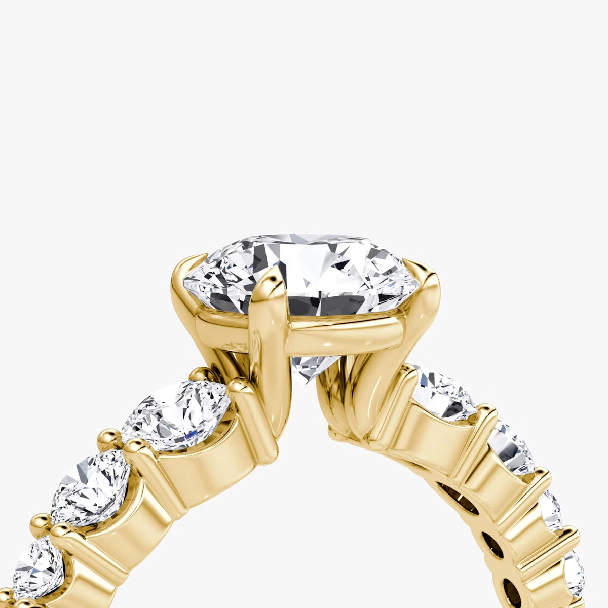 The Graduated Band Round Brilliant Yellow Gold Engagement Ring