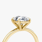 The Petite 4-Prong Solitaire Oval Yellow Gold Engagement Ring