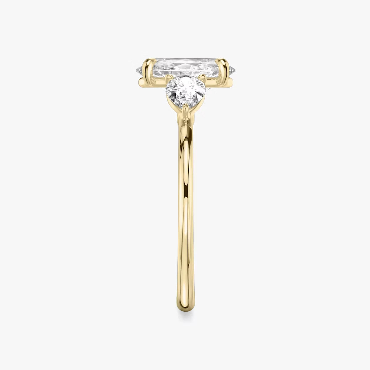 The Three Stone Oval Yellow Gold Engagement Ring