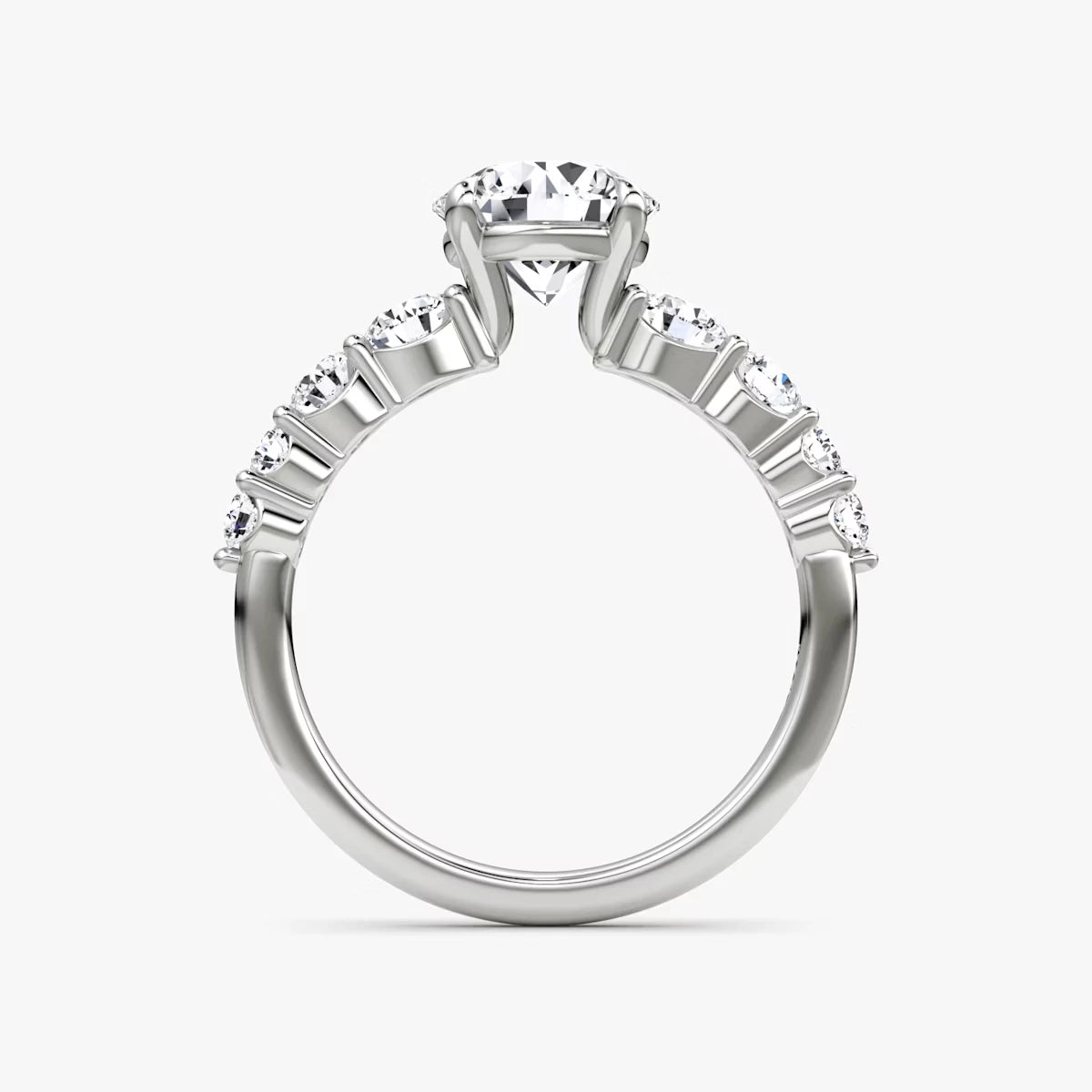 The Graduated Band Round Brilliant Yellow Gold Engagement Ring