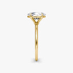 The Petite 4-Prong Solitaire Oval Yellow Gold Engagement Ring