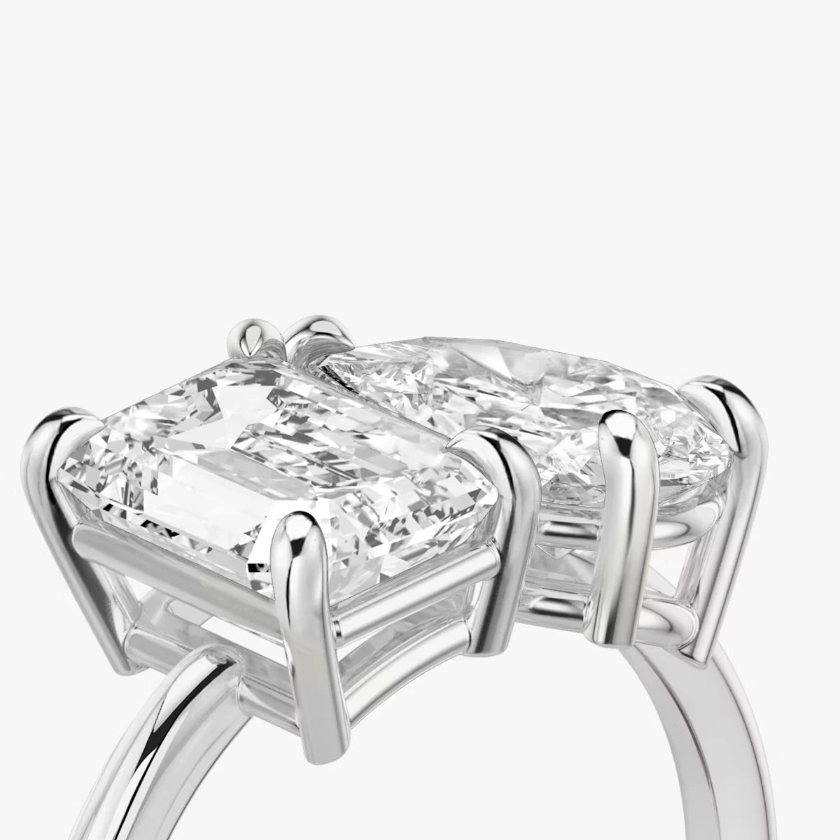 The Toi et Moi Emerald and Pear Yellow Gold Engagement Ring