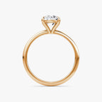 The Petite 4-Prong Solitaire Oval Yellow Gold Engagement Ring