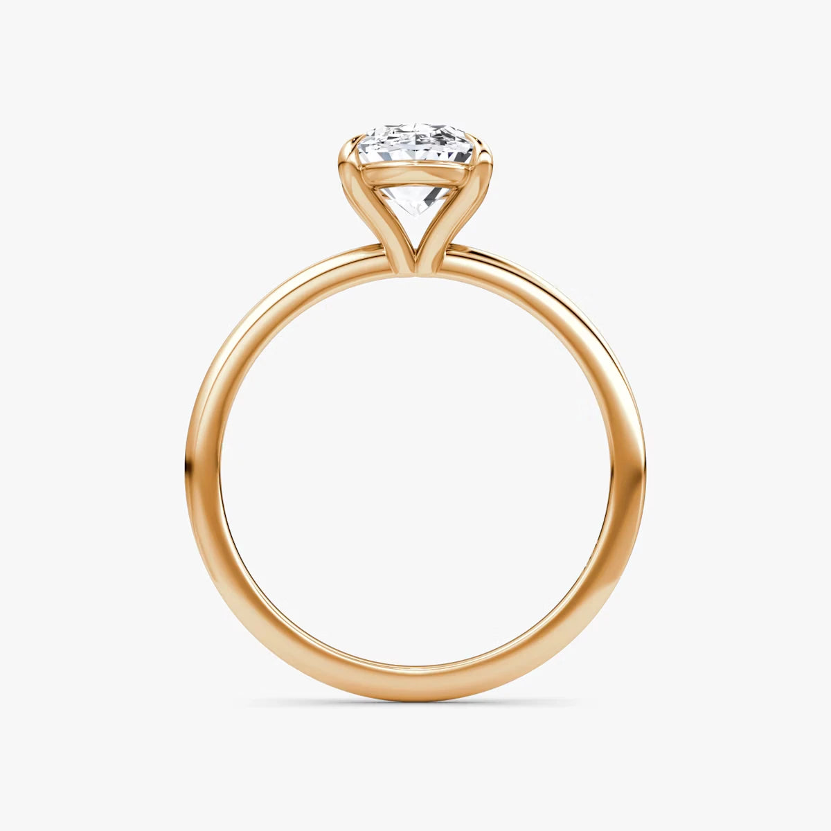 The Petite 4-Prong Solitaire Oval Yellow Gold Engagement Ring