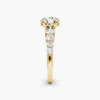 The Graduated Band Round Brilliant Yellow Gold Engagement Ring