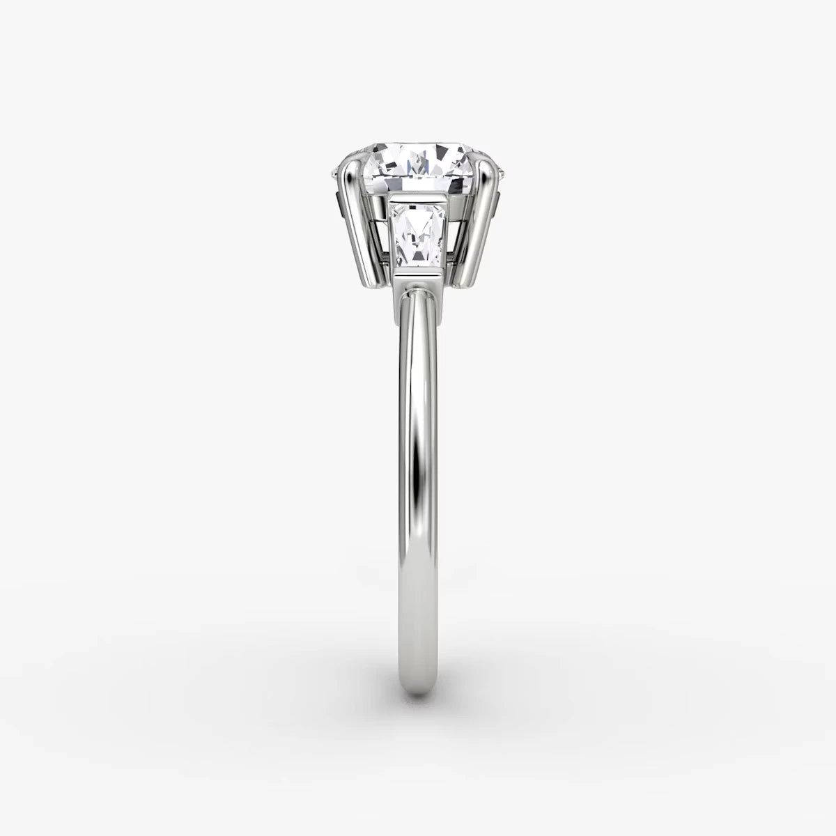 The Tapered Baguette Three Stone Round Brilliant Yellow Gold Engagement Ring