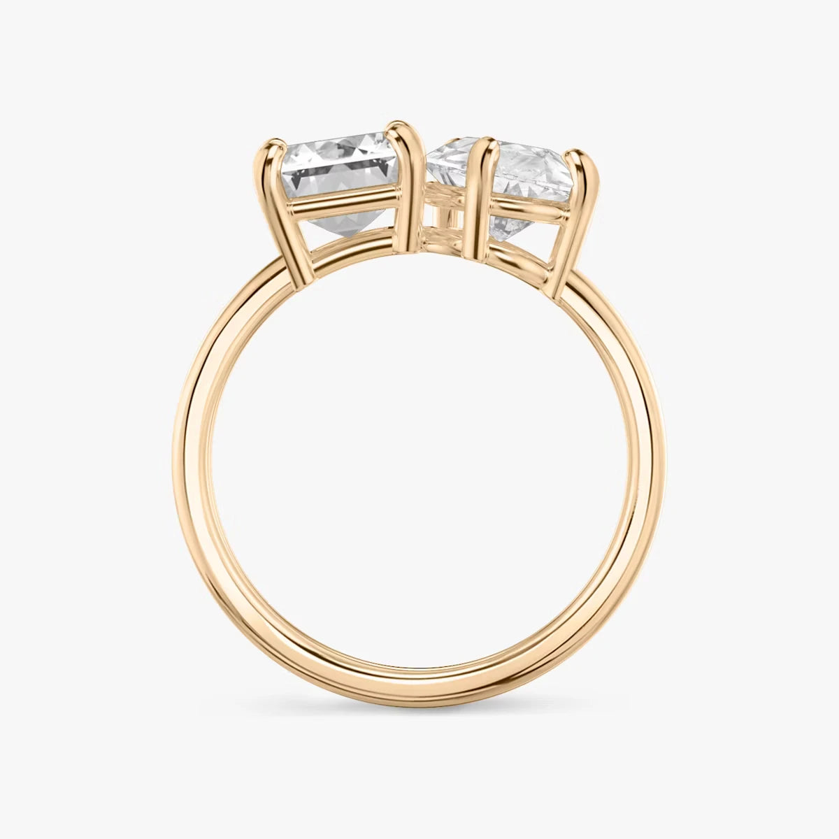 The Toi et Moi Emerald and Pear Yellow Gold Engagement Ring