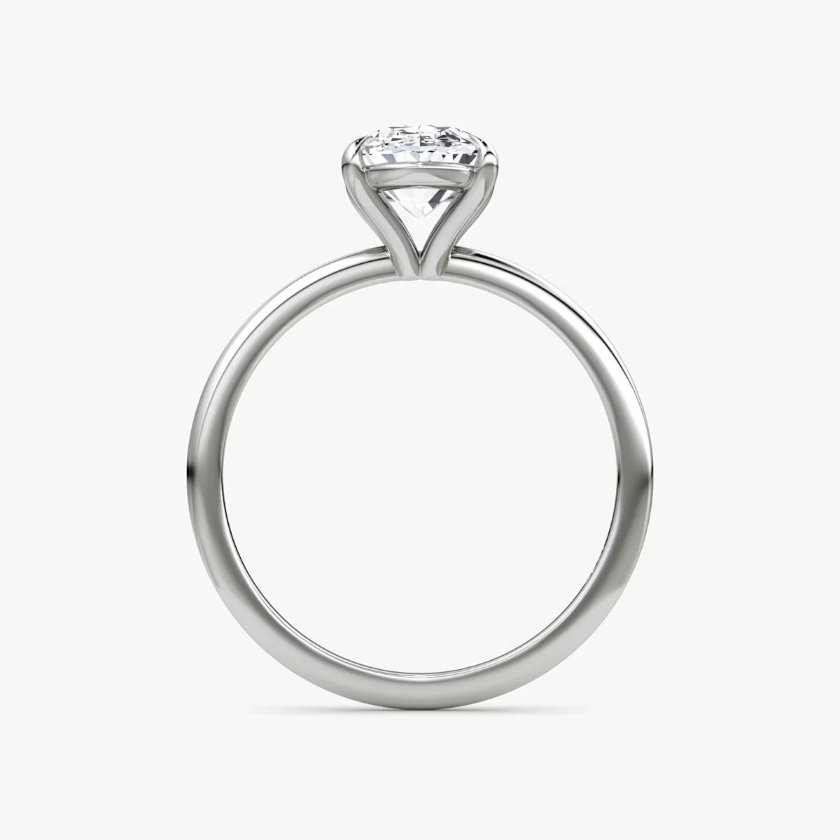 The Petite 4-Prong Solitaire Oval Yellow Gold Engagement Ring
