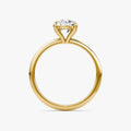 The Petite 4-Prong Solitaire Oval Yellow Gold Engagement Ring