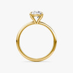 The Petite 4-Prong Solitaire Oval Yellow Gold Engagement Ring