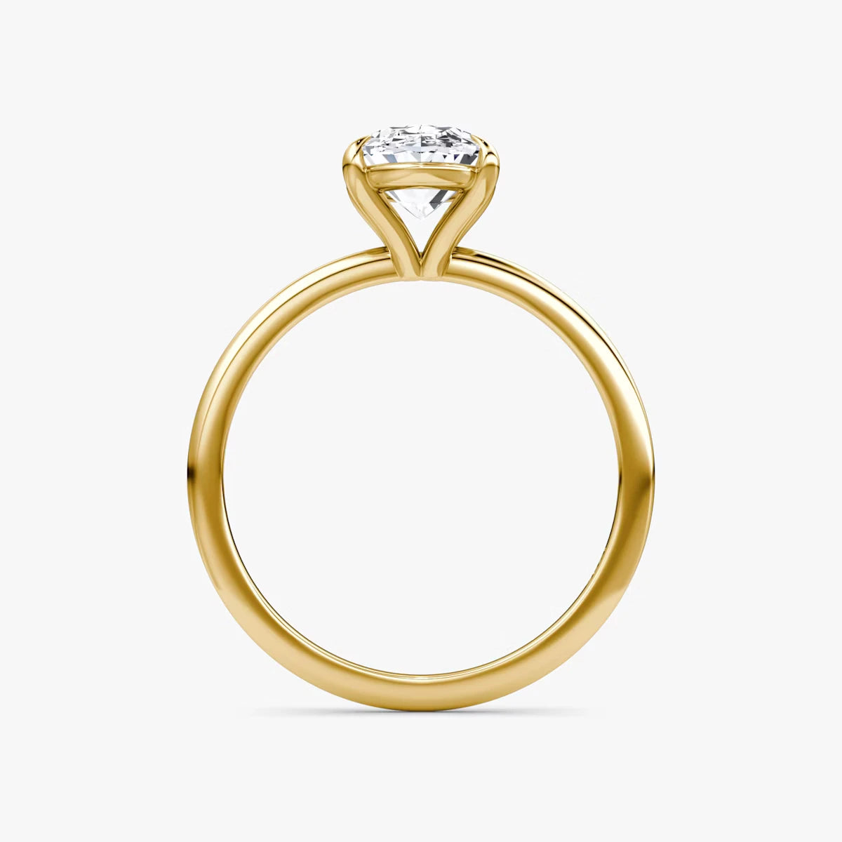 The Petite 4-Prong Solitaire Oval Yellow Gold Engagement Ring