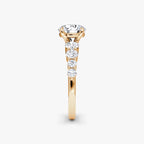 The Graduated Band Round Brilliant Yellow Gold Engagement Ring