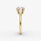 The Tapered Baguette Three Stone Round Brilliant Yellow Gold Engagement Ring