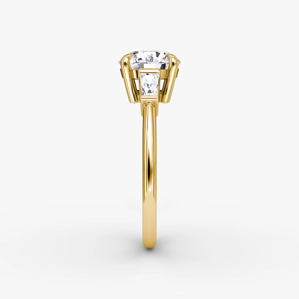 The Tapered Baguette Three Stone Round Brilliant Yellow Gold Engagement Ring