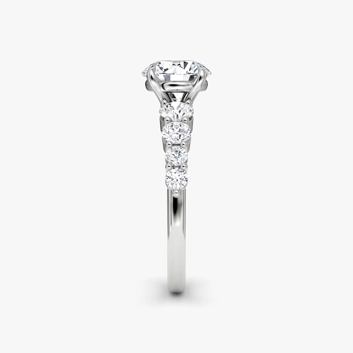 The Graduated Band Round Brilliant Yellow Gold Engagement Ring