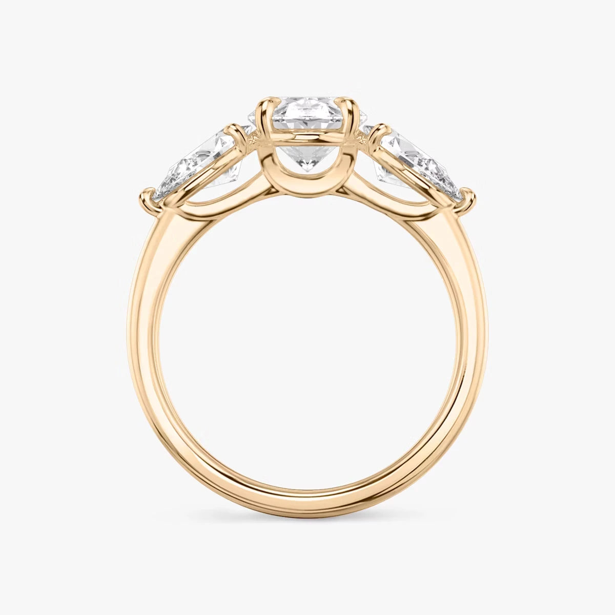 The Three Stone Oval Yellow Gold Engagement Ring
